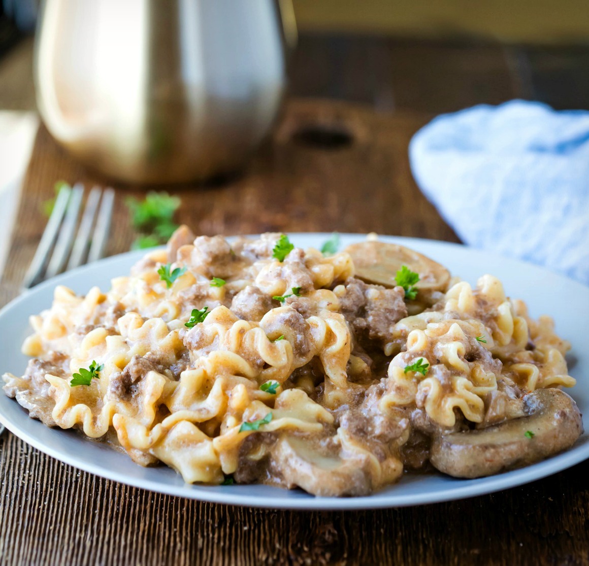 Instant Pot Ground Beef Stroganoff next to a a silver fork. 