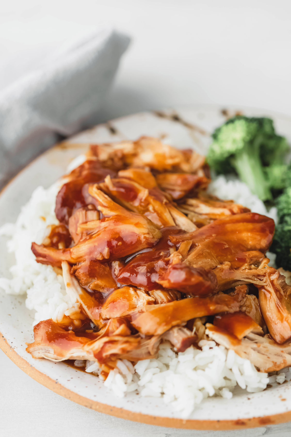 Honey bourbon chicken on a bed of rice. 