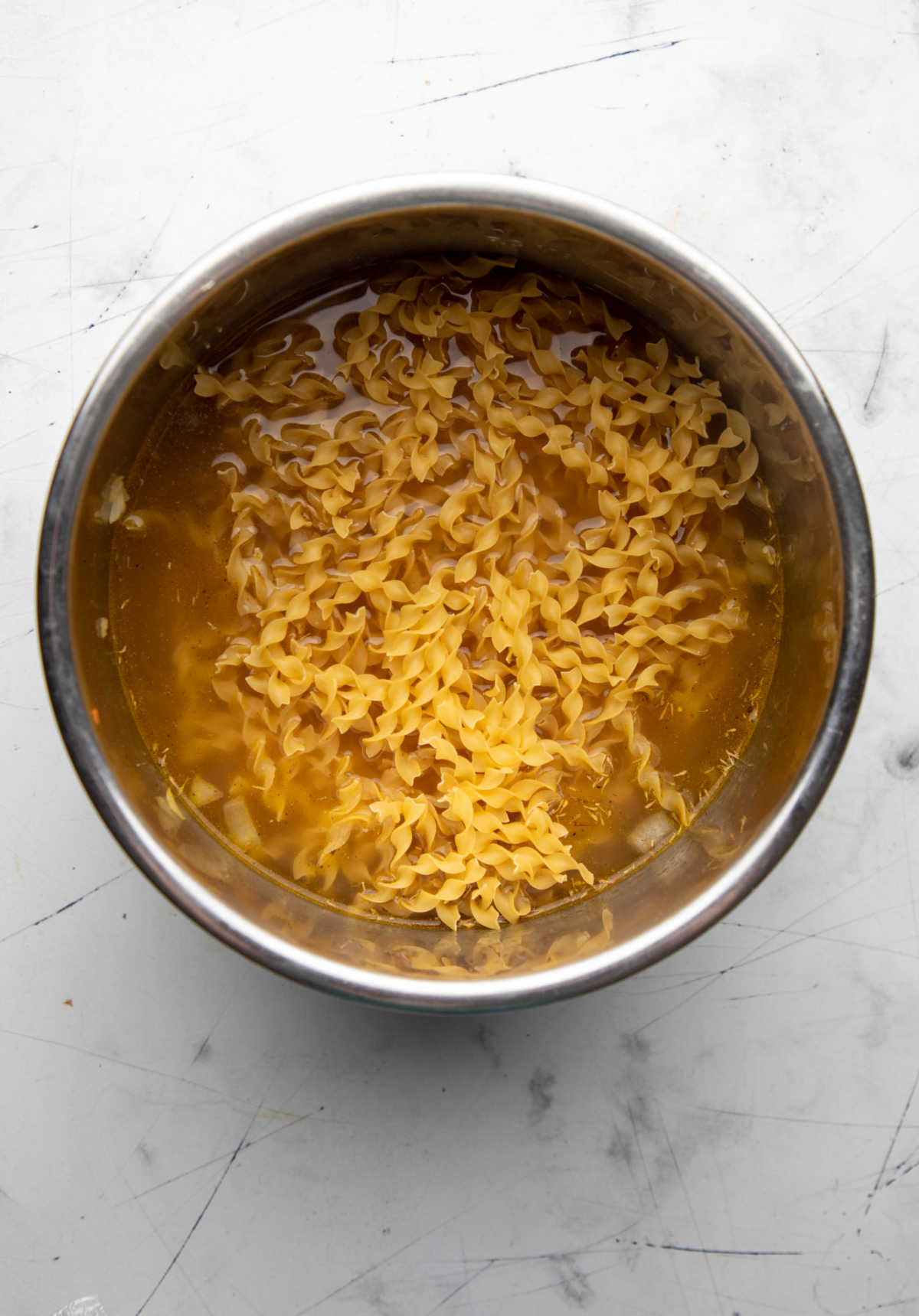 Noodles in broth in an instant pot. 