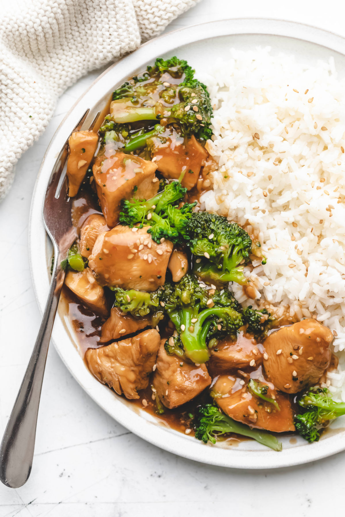 Instant Pot chicken and broccoli and rice with a fork in it. 