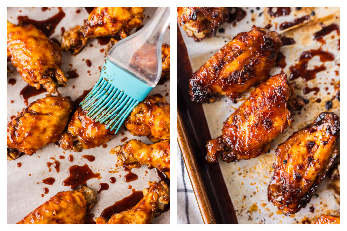A basting brush brushing glaze onto wings next to the broiled wings on a baking sheet.